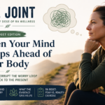 Woman sitting outdoors looking ahead thoughtfully, representing future-focused worry and reflection in rheumatoid arthritis