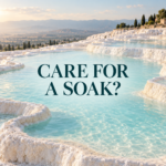 White mineral terraces surrounding turquoise thermal pools with the centered title “Care for a Soak?”